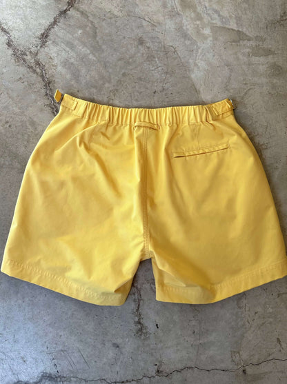 'MR LUXE' TAILORED MID-LENGTH SHORT YELLOW